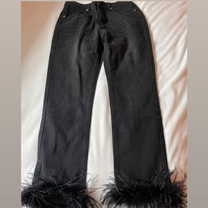 Feather trim jeans. Never worn brand new with tags